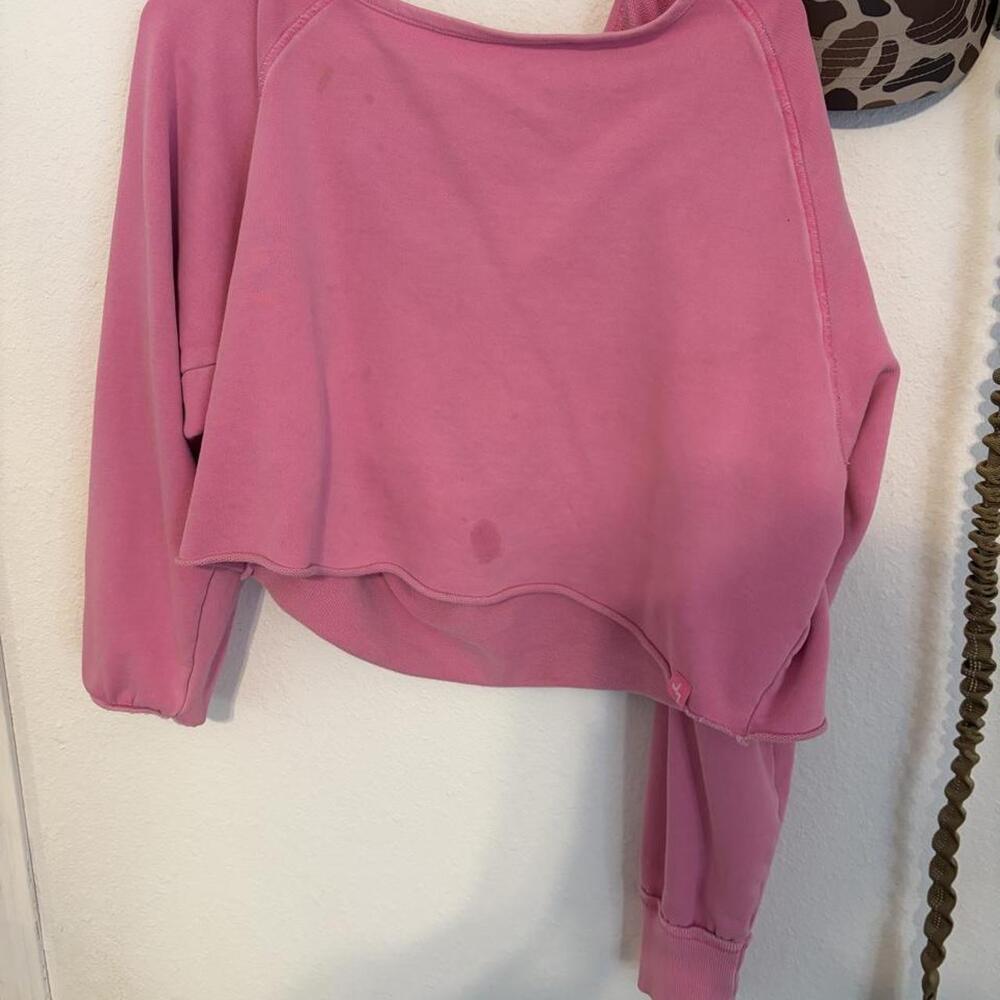 Pink off the shoulder sweatshirt in a M